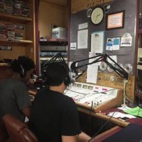 student in radio station booth