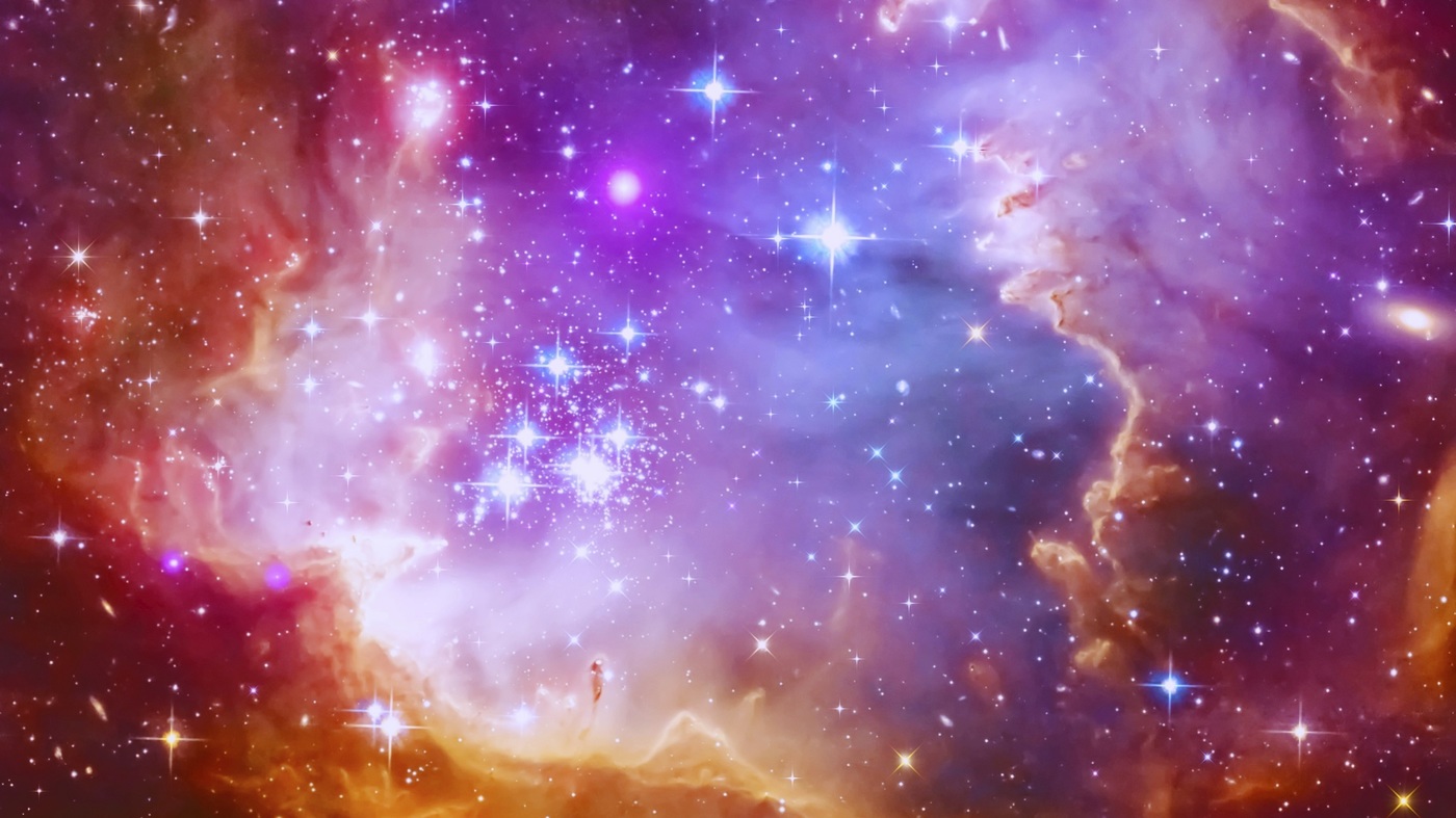picture of a nebula in space, pink and purple