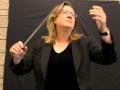 Dr. Kim Mieder conducting music
